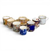 A collection of 18th and 19th century porcelain coffee cans in various patterns from different