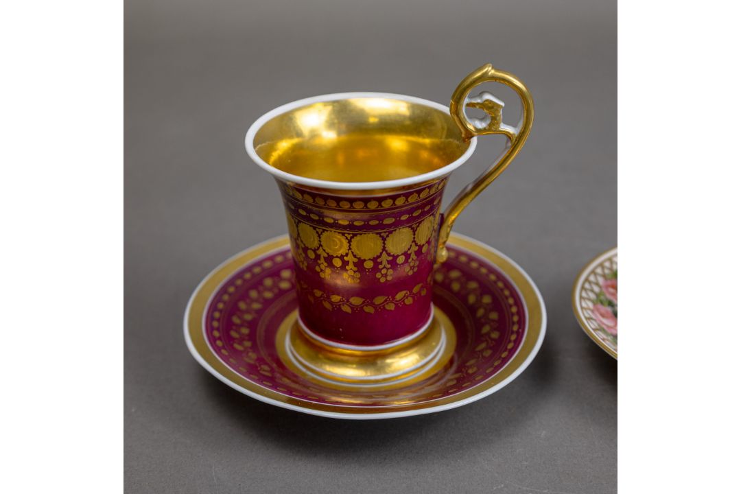 A group of five cups & saucers from various manufacturers, to include a Derby cup & saucer decorated - Image 3 of 7