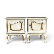 A pair vintage cream - coloured bedside cabinets, featuring ornate gold trim, carved details and