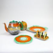 Shelley Drip Ware tea pot and stand, square plate, small toast rack and lidded jar, part of the