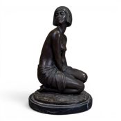After Amadeo Gennarelli (Italian 1881-1943), a bronze sculpture of a kneeling semi nude woman, on