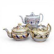 Early 19th century porcelain tea pots, featuring a rounded, low-profile body and matching lids, by