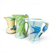 Early 20th century Burleigh Ware ceramic jugs, featuring stylised Parrot and bird handles, with leaf