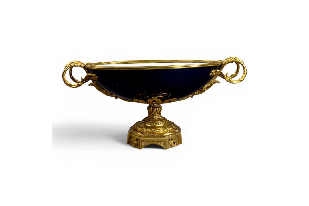 An oval porcelain serving bowl with cobalt exterior, with ornate gilt metal mounts, handle to handle - Image 1 of 8