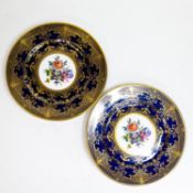Two Caverswall Fine Bone China cabinet plates decorated with a central floral panel surrounded by