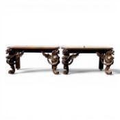 A pair of Victorian oak side tables with carved dragon supports. Cut from a larger extending