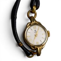 Ladies Tudor cocktail wristwatch, gold plated case with worn leather bracelet.