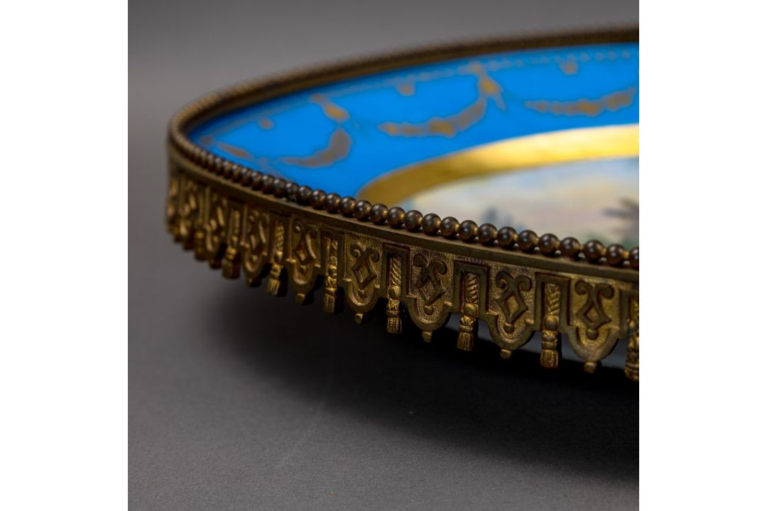 A large oval dish ornately decorated in the manner of Sevres porcelain, featuring a male and three - Image 6 of 9
