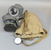 WWII era British civilian ARP respirator, together with a Smiths stainless steel stopwatch (