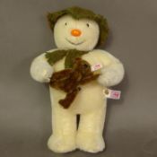 Boxed Steiff The Snowman 'Dancing with Teddy', no 00311, with CoA, height 26cm.