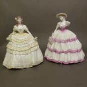 Coalport lady figurines in The Four Flowers collection, Lily CW157 and Carnation CW161 (arm broken),