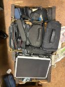 A large assortment of cameras & camera equipment, including tripods, lenses, cases, camera flash