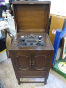 Cosmos radiophone crystal set, type A5 in oak freestanding cabinet.