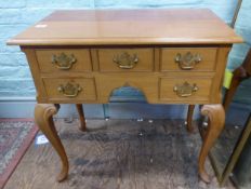 A yew wood side table with 5 drawers raised on cabriole legs 67cm W x 44cm D x 74cm H