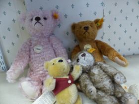 Group of four Steiff bears, Classic 1926 bear, Classic Teddybar no 3, Teddybar 1907 (pink) and a