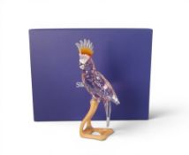 Swarovski Crystal Paradise Cockatoo, faceted pink crystal figure mounted on wooden perch (718565)