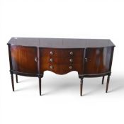 Strong Bow side-board featuring mahogany veneer with serpentine front. (H: 87cm x W: 167 x D: 52.