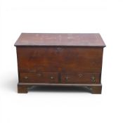 Oak mule chest with large hinged lift top for storage and two small lower drawers. (H: 58cm W:
