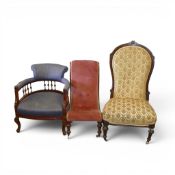 Victorian nursing chair with tall scrolled walnut frame upholstered in patterned damask fabric,