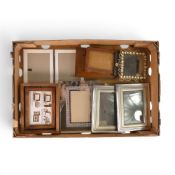 A collection of various sized picture frames. (1 Tray)