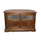 Old charm corner TV cabinet with carved linenfold panel doors & leaded glass inserts, together