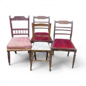 Two matching ladder-back style dining chairs, together with two non-matching ladder-back chairs. (