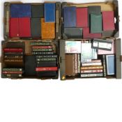 A large quantity of VHS tapes together with a collection of empty cassette boxes. Collection/courier