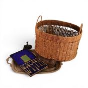 A large basket handled basket with a metal style frame together with silverplated serving tray,