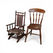 Children's American-style platform rocking chair, featuring turned spindle details & floral tapestry