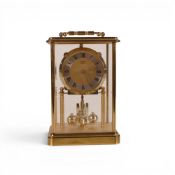 Acctim quartz anniversary mantel clock, featuring brass frame, glass panels and rotating