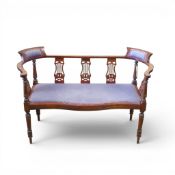 Late 19th/early 20th century mahogany salon settee, with classic three-seat back, upholstered corner