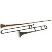 A vintage copper & brass coaching horn, together with part Hawkes & Son. trombone. a/f (L: 126cm) (