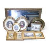 A selection of framed items to include a mirror and pictures etc.