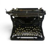 A vintage Underwood Typewriter model no:- 6 , with ink reel present (unchecked).