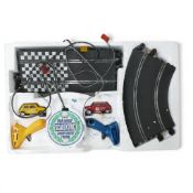 Vintage Scalextric Model Motor Racing set featuring two 1960's Mini's, controllers and track. Poor