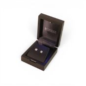 Platinum set 0.25ct x 20 diamond pair earrings by Rhapsody, round brilliant & baguette stones.