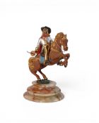 A Gilt and silvered bronze Sculpture by Giuseppe Vasari of a Muskateer on Horseback on an Onyx base,