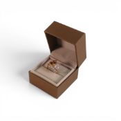 Oregon Sunstone & diamond set 18ct gold ring, size N/O. Design by Lorique, 5.15g.