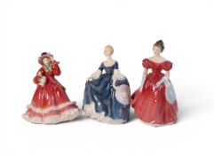 Three Royal Doulton Lady figures to include Hilary HN 2335, Christmas Time HN 2110 & Winsome HN