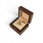 18ct yellow gold set Tanzanite (1.5ct AAA) ring size N/O by Rocks & Co., 6.95g.