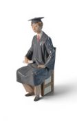 A Lladro figure 'Boy Graduate ' model 5198, height 27cm. Good Condition