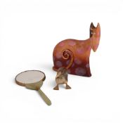A Chinese hand mirror featuring a decorative porcelain panel, pale green jadeite handle and