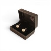 Platinum .950 set pair of large 10mm cultured pearl earrings.