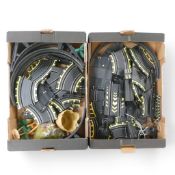 A collection of loose slot car racing track and accessories. (2 Trays)