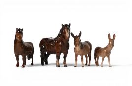A group of Four Beswick models to include a Shetland Pony model 1033, Shetland Pony model 1648,