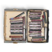 A collection of metal kit-built OO gauge LMS liveried passenger coaches, some carriages with painted