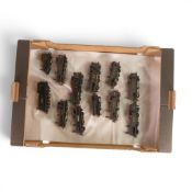 A collection of loose OO gauge steam locomotives from various manufacturers, most containing a