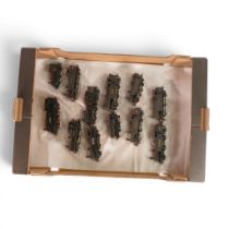 A collection of loose OO gauge steam locomotives from various manufacturers, most containing a