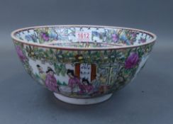 A Late 19th Century Chinese bowl , typically heavily decorated with Chinese figures and Boy on a