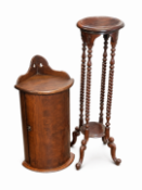 A mahogany two tier plant stand with barley twist legs together with antique curved fronted wooden